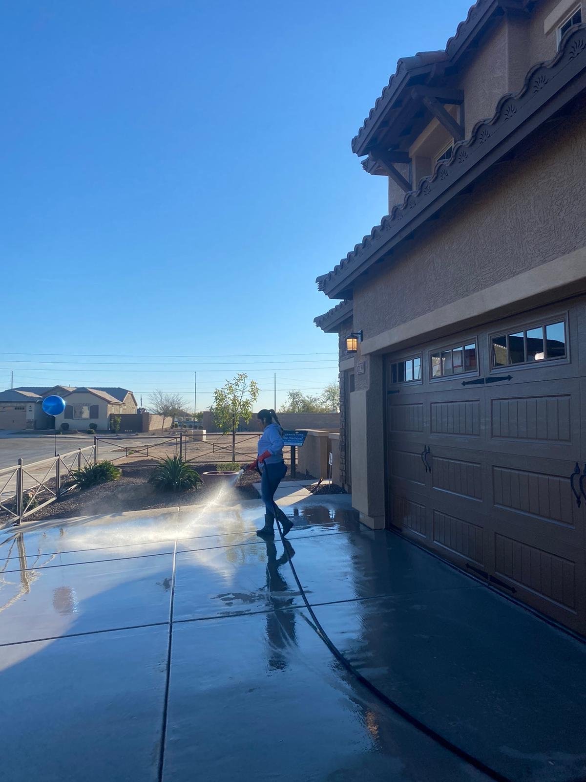 Pressure washing a driveway