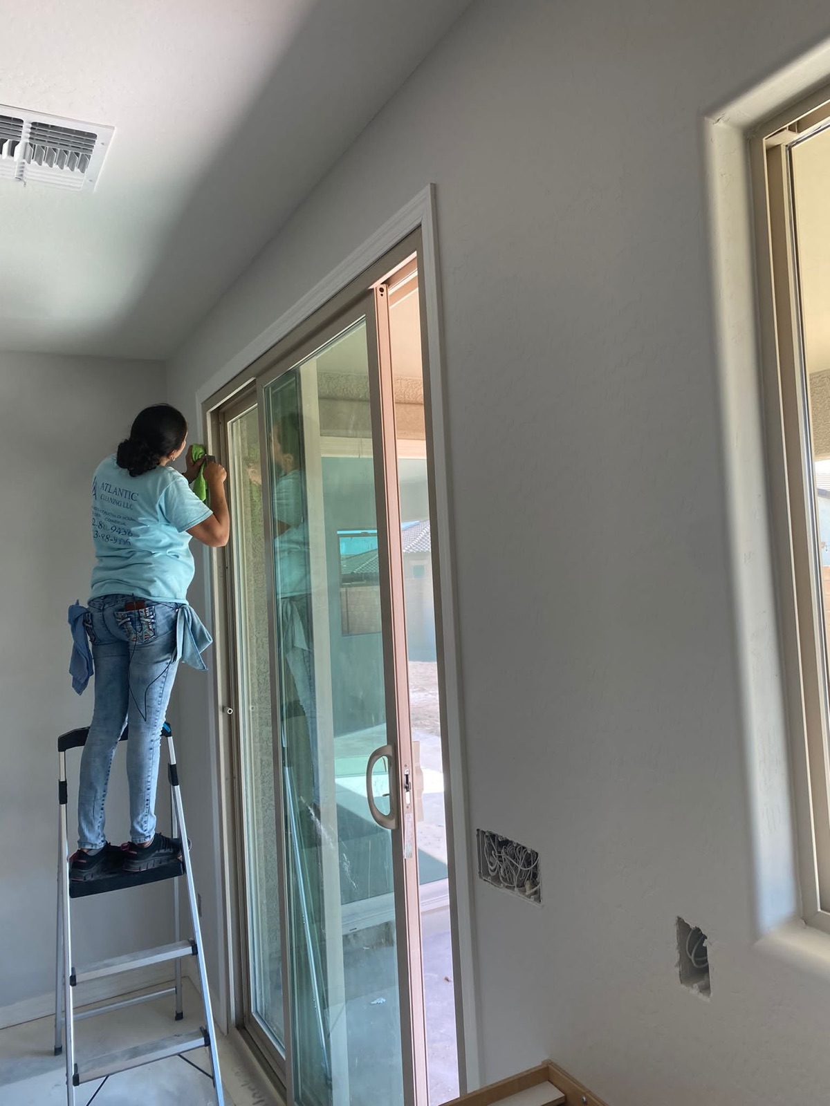 Cleaning the windows of a newly built home